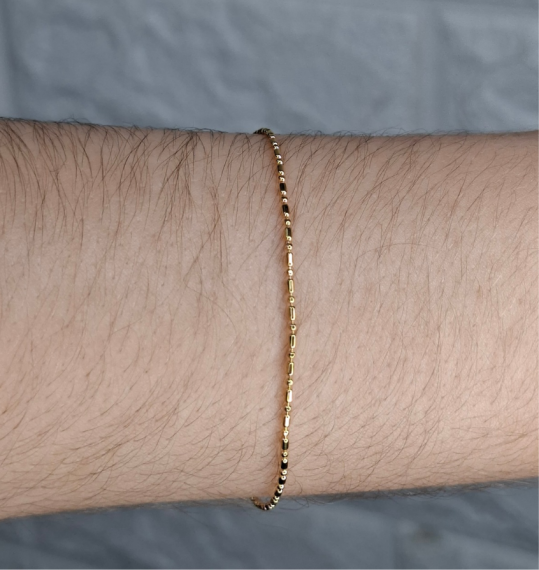 Pulseira infantil elo comprido e bolinha - Folheado a ouro 18k